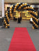 Black & Gold Spiral Arch with Letter Balloons - The Ultimate Balloon & Party Shop