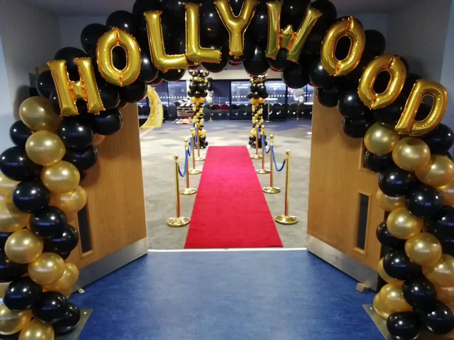 Black & Gold Spiral Arch with Letter Balloons The Ultimate Balloon And Party Shop Cheltenham & Gloucester Balloons & Fancy Dress 