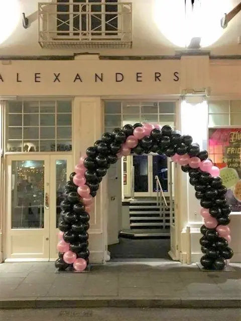 Black & Gold Spiral Arch with Letter Balloons The Ultimate Balloon And Party Shop Cheltenham & Gloucester Balloons & Fancy Dress 
