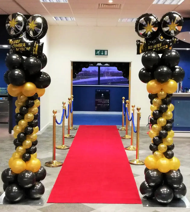 Spiral Column with Foil Balloon Topper - Black &  Gold Hollywood Theme The Ultimate Balloon And Party Shop Cheltenham & Gloucester Balloons & Fancy Dress 