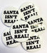 Christmas Badge - Santa Isn’t Real - The Ultimate Balloon & Party Shop