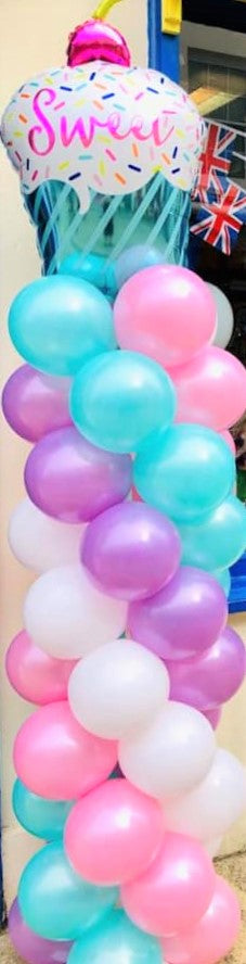 Pretty Pastel Balloon Column with a Sweet Cake Topper - The Ultimate Balloon & Party Shop